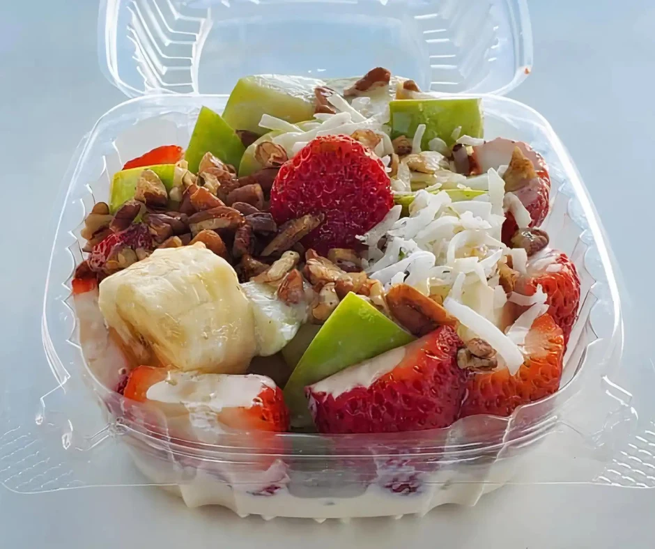 Bionico - A refreshing Mexican fruit salad with fresh seasonal fruits, cream, granola, and coconut — sweet and satisfying.